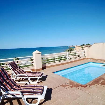 Apartamento Ático espectacular con piscina privada en primera línea de playa