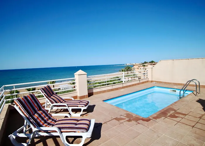 Apartamento Ático espectacular con piscina privada en primera línea de playa